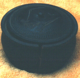 round black wooden box
